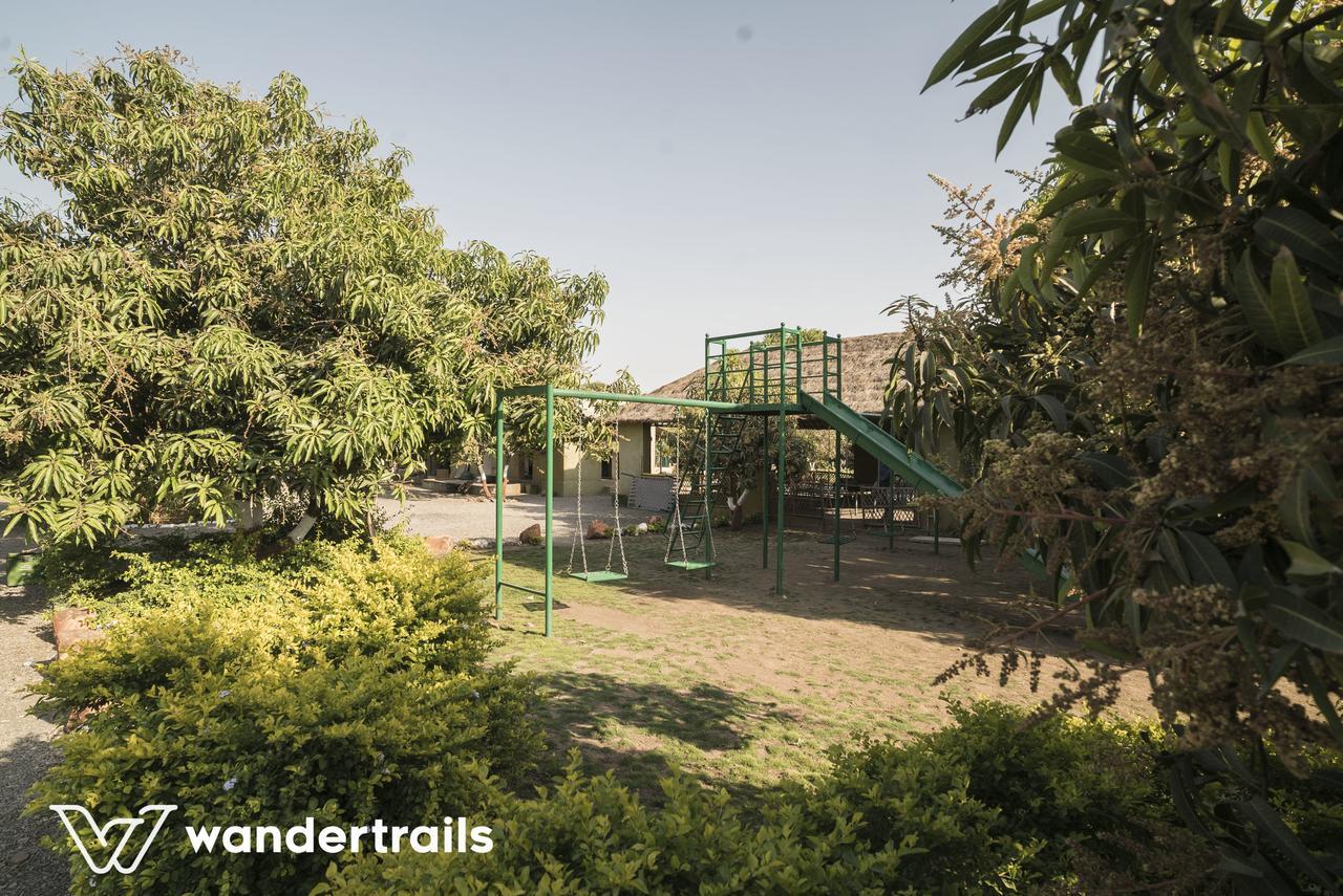 Lookout Villa - A Wandertrails Stay Sasan Gir Bagian luar foto