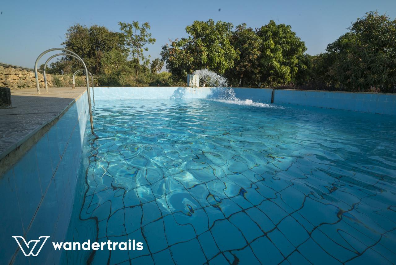Lookout Villa - A Wandertrails Stay Sasan Gir Bagian luar foto